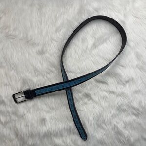 black leather belt featuring a built-in measuring tape design in turquoise XXXL